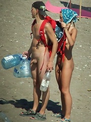 Overheated beach nudists sunbathing and feeling up...